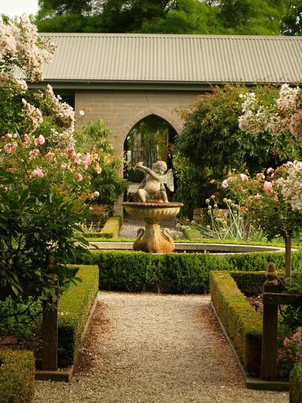 1-vacker-trädgård-med-vit-grus-för-gränd-fontän