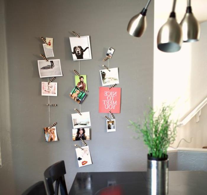 1-hur-att-dekorera-ditt-vardagsrum-grå-väggar-grön-växt-på-bordet