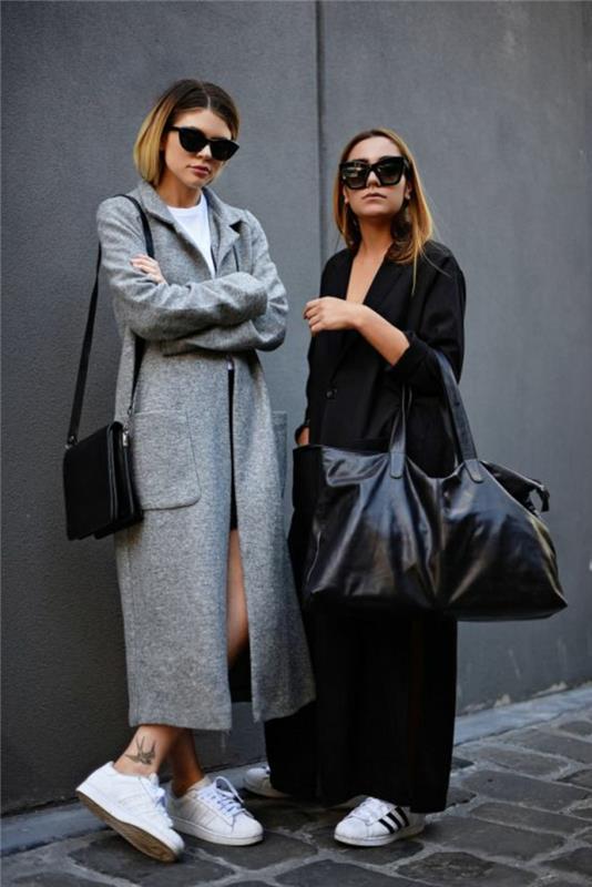 1-moderná-žena-dlhý-camaieu-kabát-s-čiernymi teniskami a slnečnými okuliarmi