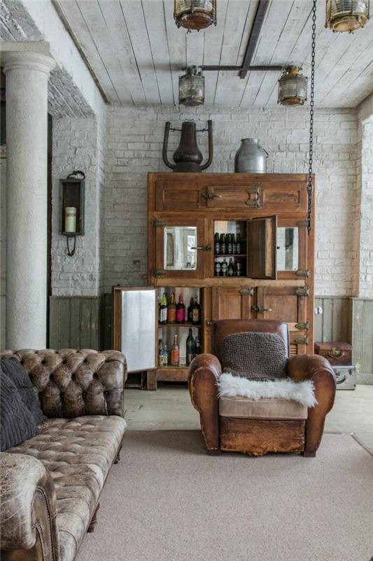 1-rustikálna-obývačka-obývačka-v-tmavo-hnedej-koži-drevenom-nábytku-tehlovej stene-strop-v-podlahách