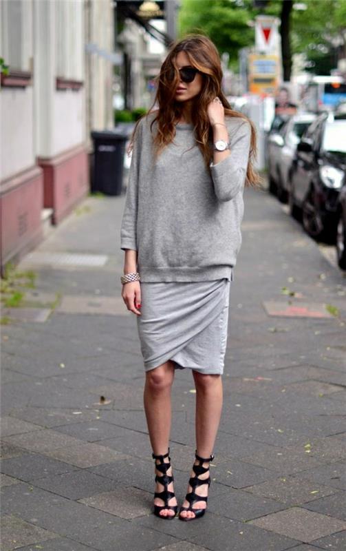 1-grå-tröja-kvinna-medellång kjol-grå-solglasögon