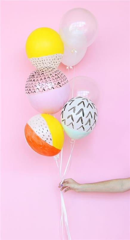16-gäng ballonger på en rosa bakgrund