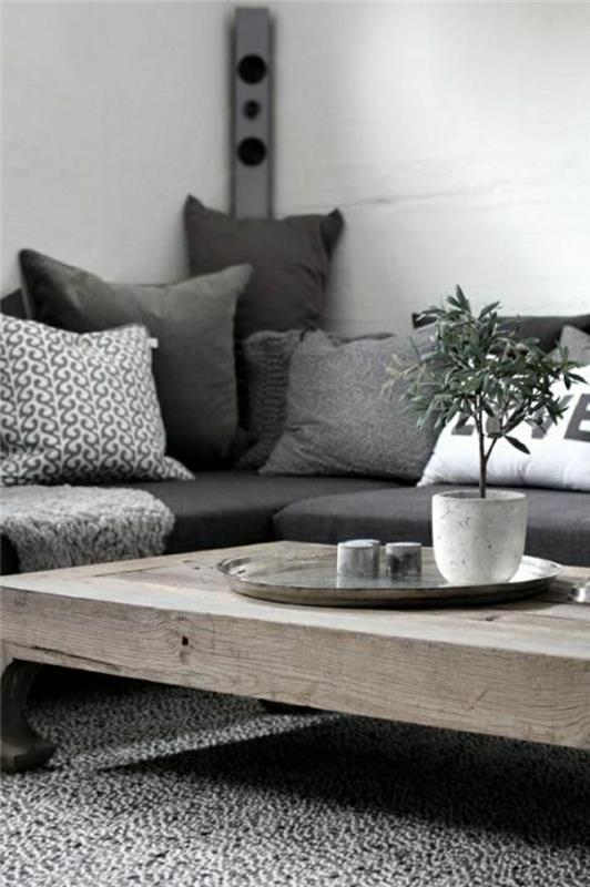 2-1-kudde-gifi-kudde-60x60-grå-vit-massiv-trä-bord-vita-väggar-grå-matta
