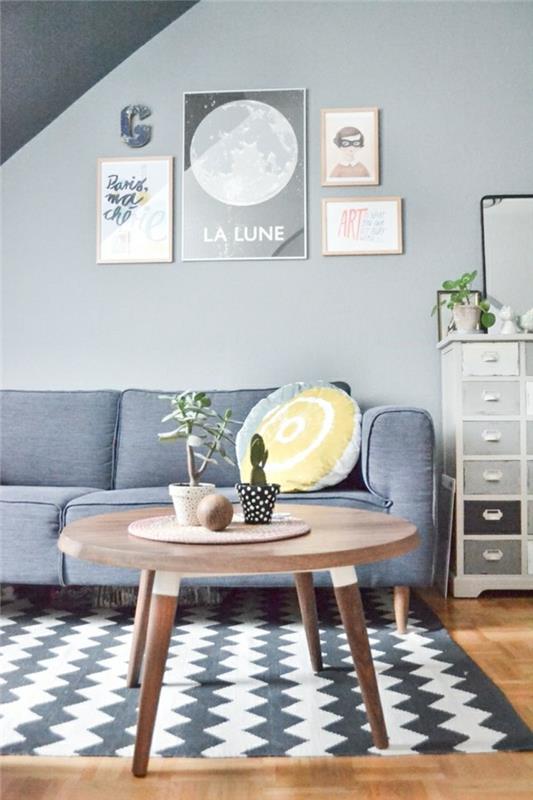 2-ljusgrå-inre-och-grå-matta-i-vardagsrummet-med-ett-runt-dricka-soffbord