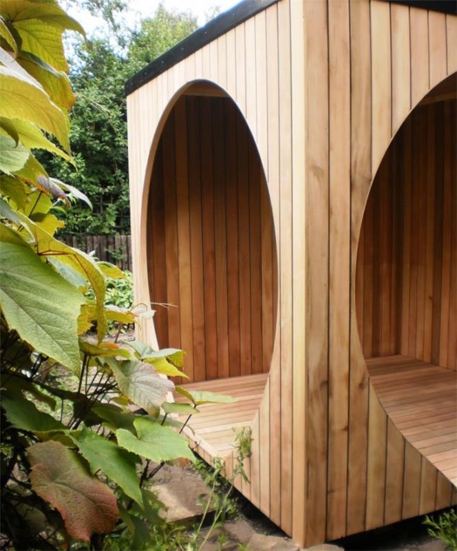 trä-trädgård-skjul-design-runda-öppningar