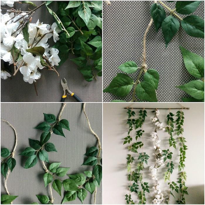 DIY sovrumsinredning, väggdekoration med en krans av gröna blad och vita blommor som hänger från en träpinne