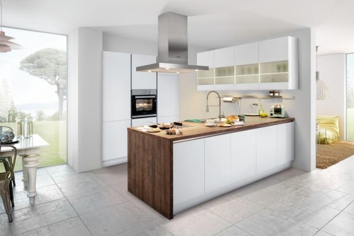 foto moderná kuchyňa s bielymi stenami s pracovnou doskou zo surového dreva, kuchynským dekorom v bielej farbe a drevom s nerezovým faucetom