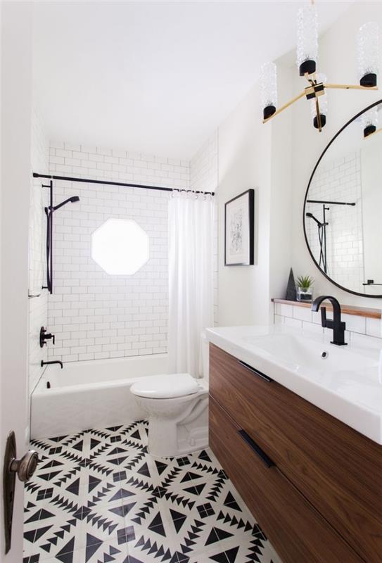 vit och svart badrum deco idé med mörkt träskåp, rund spegel modell med matt svart ram