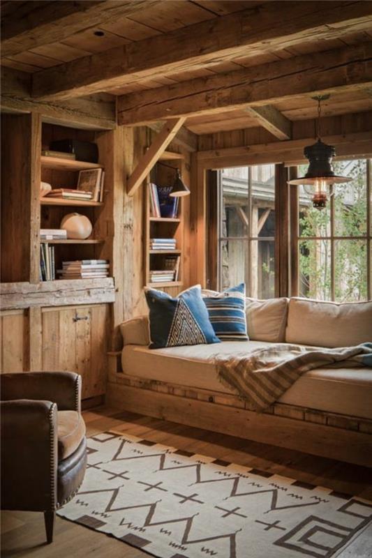 تأثيث-a-barn-perfect-resting-place-blue-cushion-in-geometric-pattern-soft-blanket