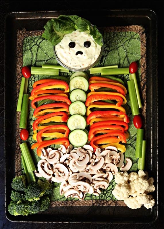 skelettformade råa grönsaksfat för halloween-aperitif, grönsaksskelett