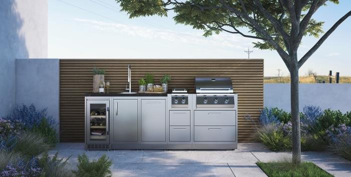 moderný dizajn záhradnej kuchyne s nerezovými modulmi a žulovou pracovnou doskou, model vonkajšieho drezu