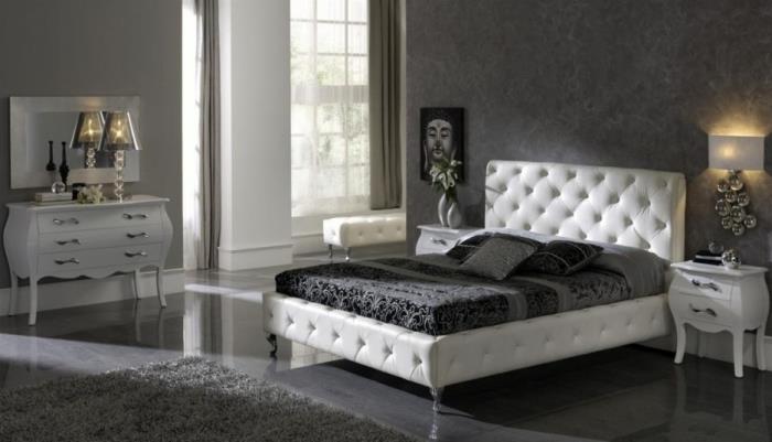 avkopplande och zen atmosfär i en kvinnas sovrum med grå väggar och lackerat golv med vita möbler