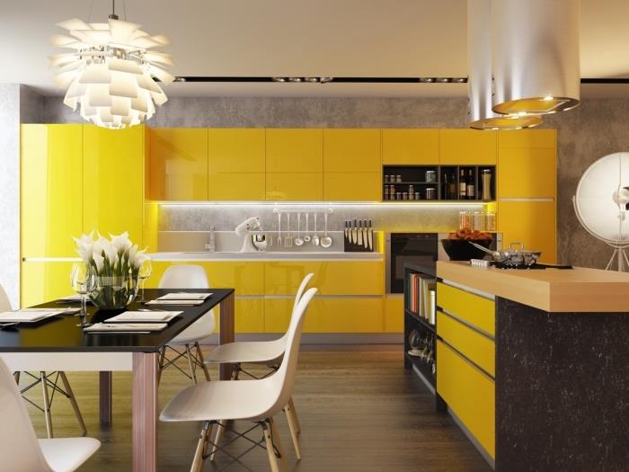 moderný model kuchyne s betónovou stenou a farebným nábytkom, príklad rozloženia dlhej kuchyne