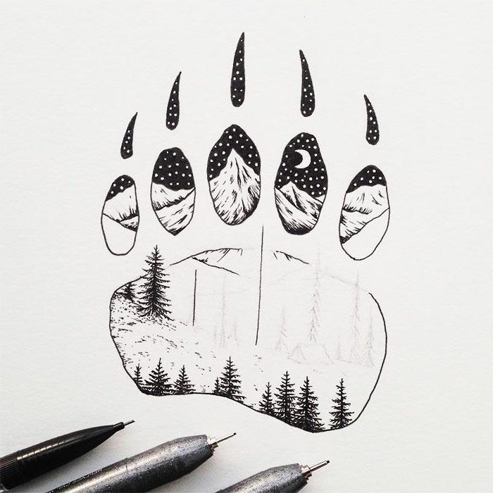 Svartvitt ritbräda vit penna ritning på svart papper björntass och nattlandskap