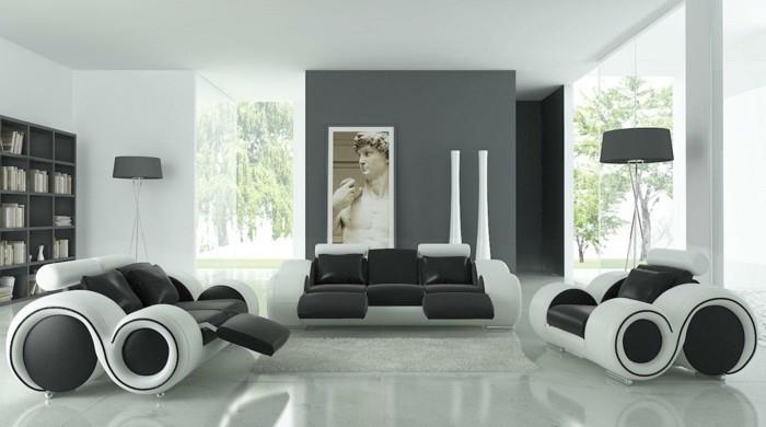 minimalistisk design, svart och vitt, skinnsoffor och fåtöljer, grå vägg, färger som passar till grått