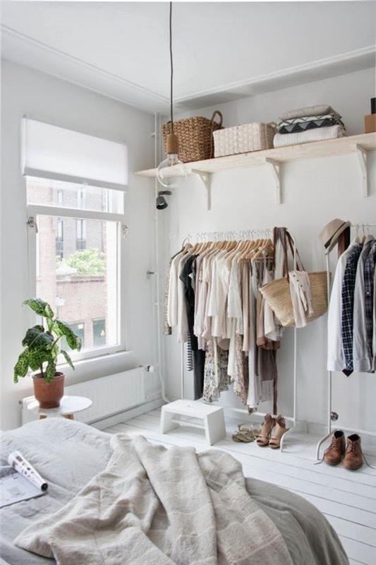 Garderobskåp i sovrummet, grå draperingsäng, skandinavisk dekorationsförvaring moderna hemkläder