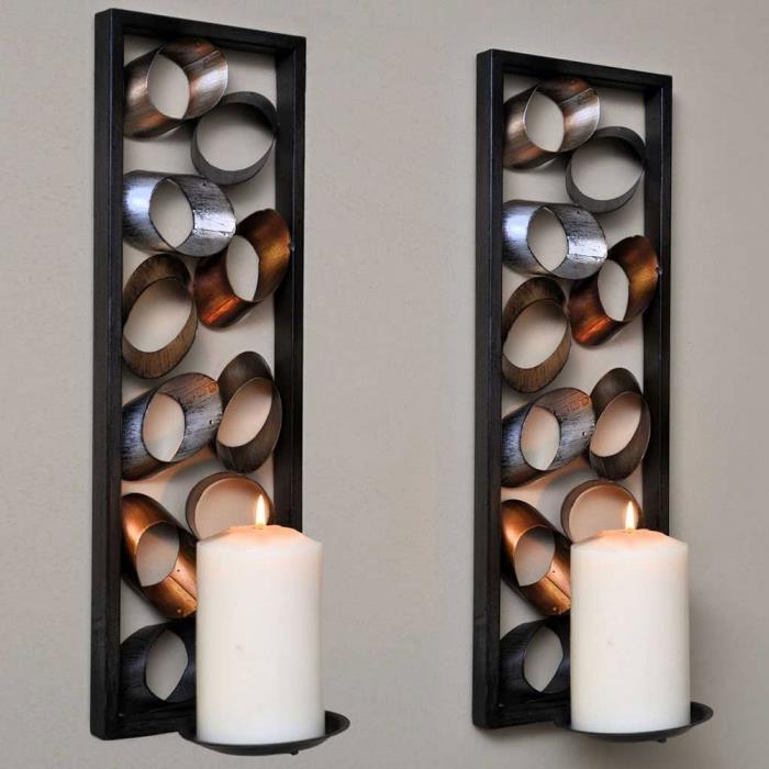 snygg ljusstake modell med mörk metalldesign och rektangulär ram, idé hur man dekorerar väggar med metallskulptur