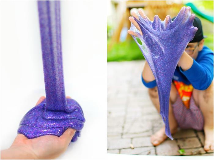 كيفية صنع الوحل ، اللزج اللامع المتلألئ باللون الأرجواني ، مع لمعان وردي وأزرق ، يُسكب على يد ، ويلعب به صبي صغير