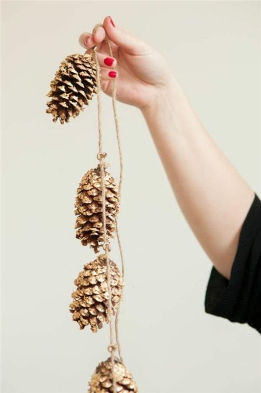 DIY عيد الميلاد جارلاند من بين المخاريط