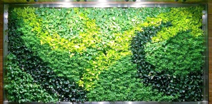 vertikálna plodina s niekoľkými odtieňmi zelenej a žltej, špirálovitými a vlnovými vzormi, interiérový koberec na stenu, veľký obdĺžnikový upokojujúci zelený panel