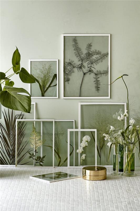 gör ett vackert inramat blommarrangemang för att ge en växtlighet och vintage touch till dina väggar