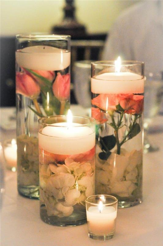 Idé per delle candele profumate fai da te, portacandele di bicchieri di vetro con fiori all'interno