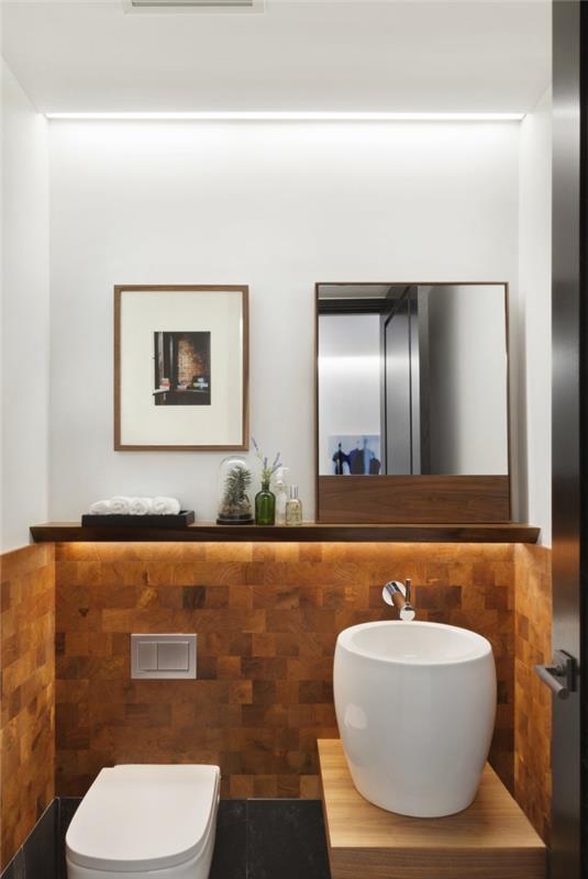 nápad na výzdobu toalety, rozloženie toalety s dvojfarebnými stenami s hnedými dlaždicami a bielou farbou, závesný dekor toalety