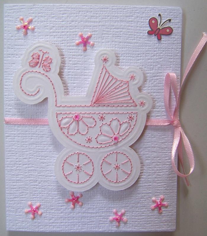 kartička s kočíkom k narodeniu dievčatka, ružová stužka a iné výšivky