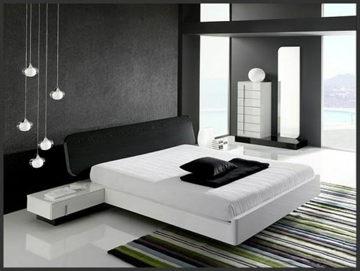 vuxen-sovrum-design-mörkt-och-vitt-sovrum