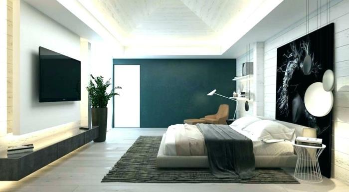 غرفة نوم حديثة ، سجادة رمادية ، سرير منصة ، تلفزيون مثبت ، تصوير فني ، لون حائط غرفة النوم الخضراء