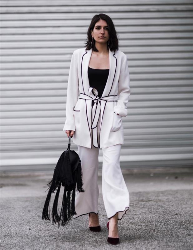 hur man klär sig bra i vit och svart kvinna, byxdressmodell i vitt med svart kant och bälte