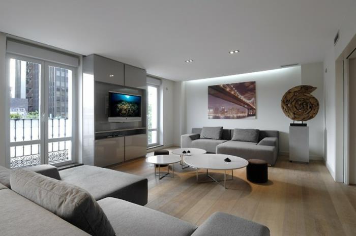 Idee per interni casa, salotto con due divani, mobile tv grigio lucido