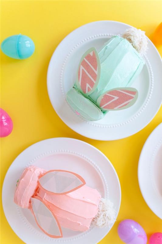 enkel och original påskdessert, påskkaninformad molly cake-muffin med rosa eller pastellgrön tonad smörkrämglasyr