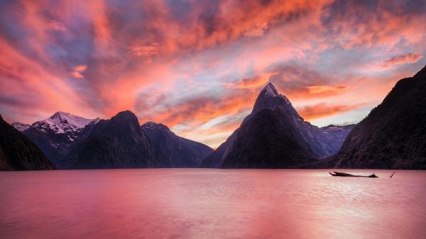 západ slnka-Milford-zvuk-západ slnka-na-Novom Zélande-zapadajúce-slnko-foto-pekné