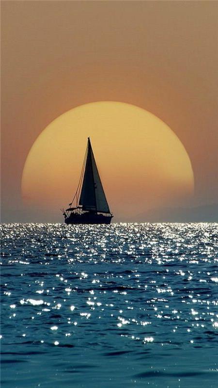 sunset-destination-at-seaside-shadow-boat