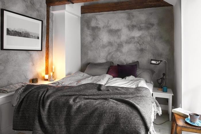 Skandinavisk atmosfär i ett rum målat i kvartsgrått, kokongdekoration med trämöbler, kolgrå pläd med fransar