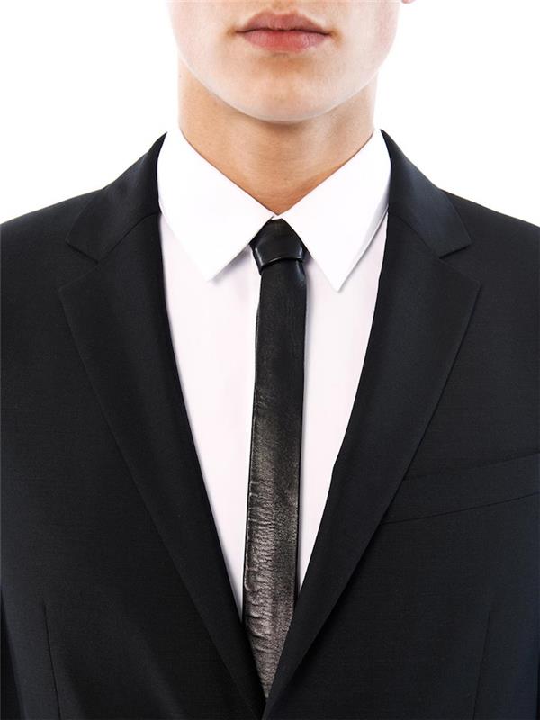 foto av svart smal läder slips på saint laurent kostym och vit skjorta