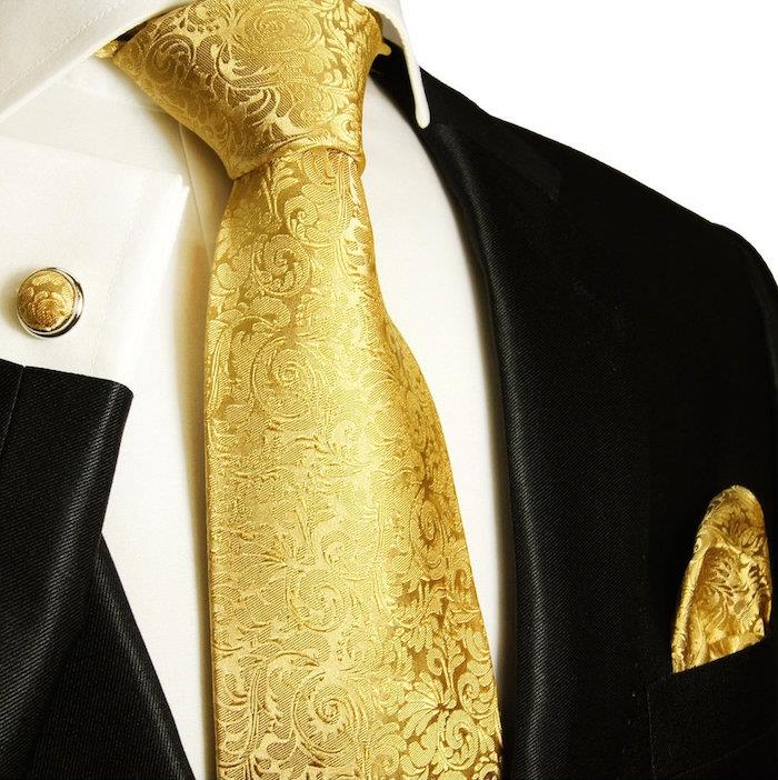 gyllene sidenbandsmodell med matchande windsorknutbroderi med manschettknapp och ficka med svart smoking