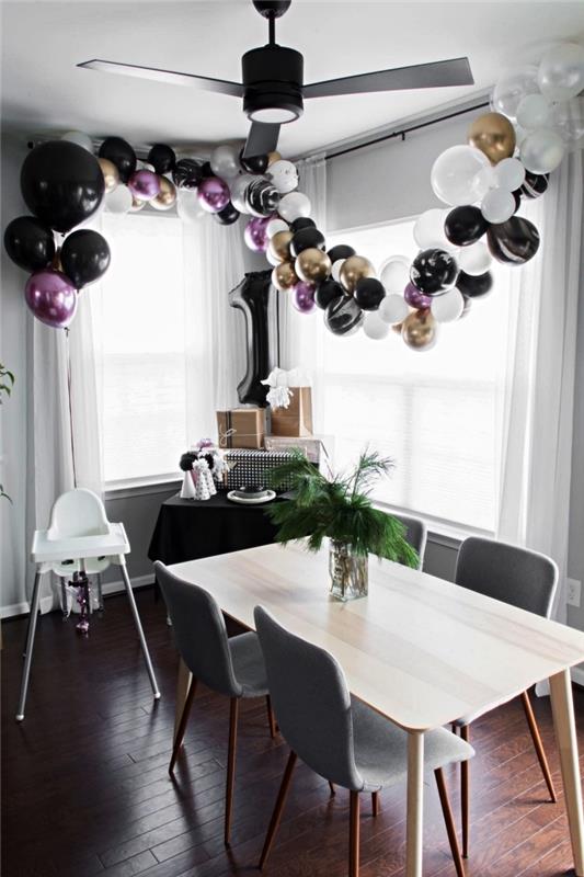 svartvitt minimalistisk stil 1 födelsedagsdekoration med enkel ballongbåge och nummerballong