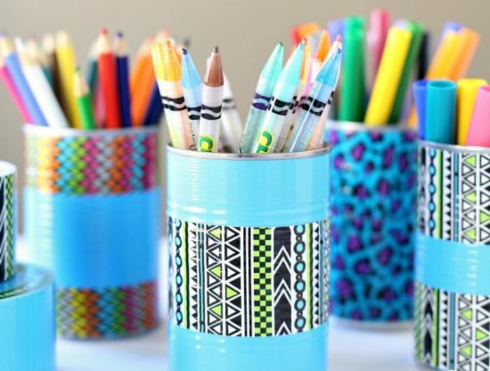 Deco-tin-can-repainted-in-blue-and-custom-with-blue-paint-and-masking-tape-strips
