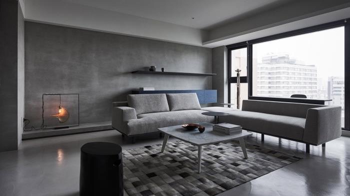 hur man integrerar grå färg i din lägenhet, designer vardagsrumsmöbler i ljusgrått med en svart pall