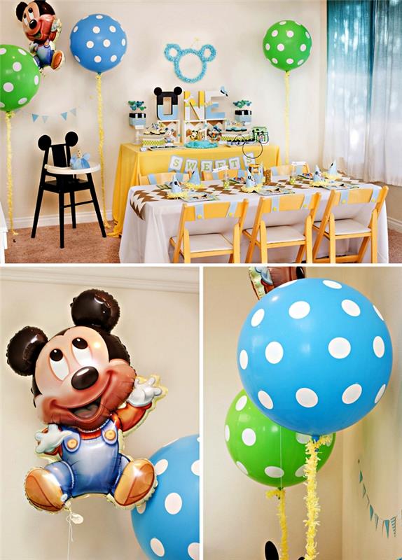 baby födelsedagsdekor på mickey mouse -temat i blått, grönt och gult, mickey mouse ballongdekor och prickiga ballonger, tema gourmetbuffé för ett års födelsedag dekorerad med personliga träbokstäver