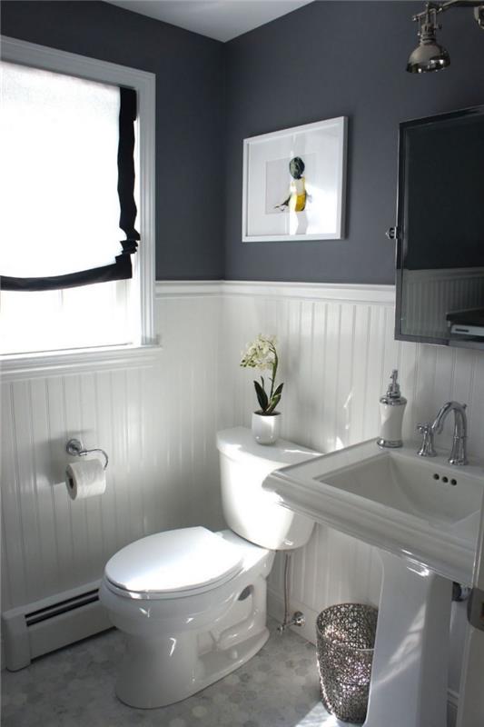 Nápad na usporiadanie toalety s dvojfarebným dizajnom, model toalety s antracitovo šedými a bielymi stenami s povrchovou úpravou z nehrdzavejúcej ocele