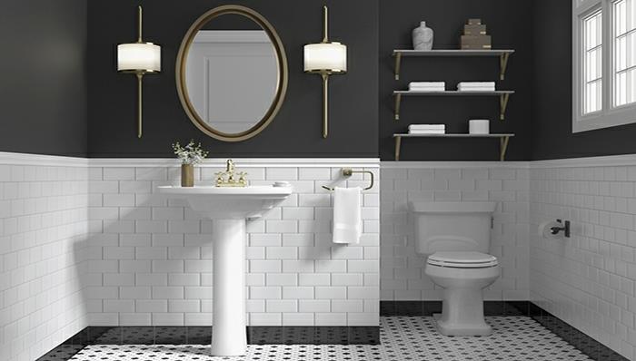 čiernobiele usporiadanie toaliet, oválne rámové zrkadlo, umývadlo na podstavec, nástenné police, biele dlaždice metra