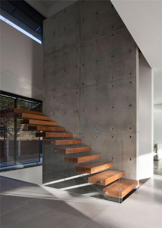 glas-och-betong-vägg-upphängd-trappa-räcke