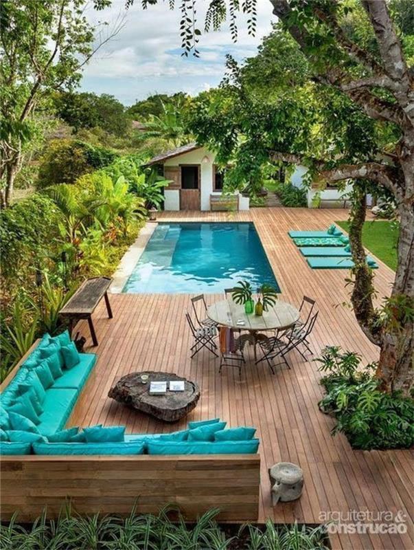 فكرة جميلة أريكة شرفة حمام السباحة في زاوية الزبرجد ، تخطيط شرفة صغيرة ، ديكور حديقة في الهواء الطلق ملونة