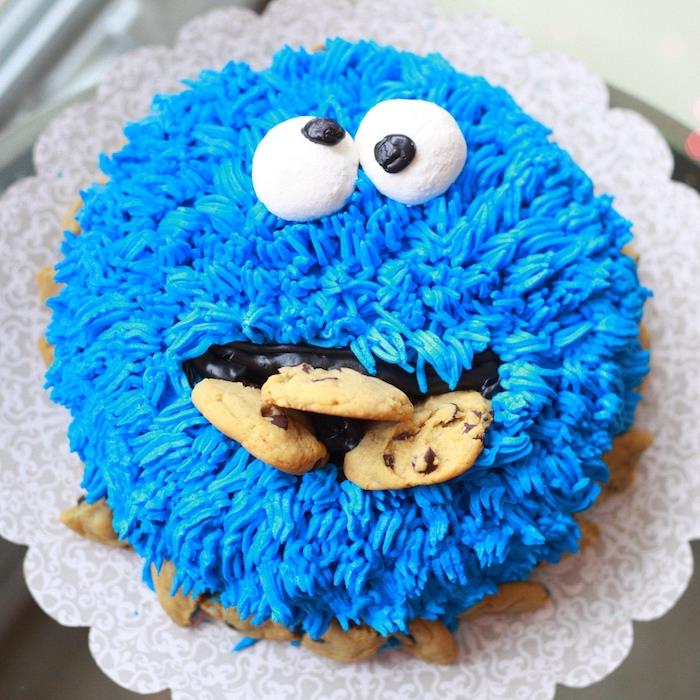 cookie monster cake the glutton macaroon textured cake with blue butter cream, eatible wiggly eyes and cookies in the mouth