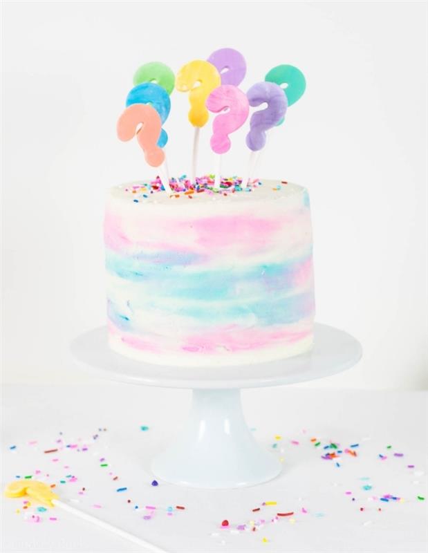 utsökt pinatatårta för en babyshower, akvarellfrostkaka fylld med rosa godis, dekorerad med utropstecken tårtoppar