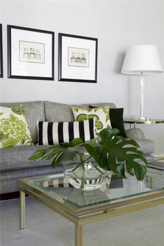glas soffbord, grå soffa, grön blommig, kuddar, vilka färger matchar med grå, inramad hängande konst