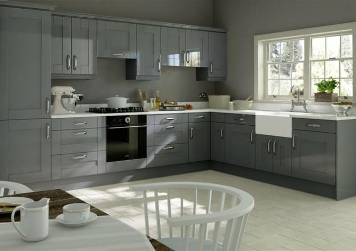 zaujímavá myšlienka-sivá-kuchyňa-sivá-nástenná maľba-antracitová-farba-kuchynská skrinka-biele-pracovné-topy-rustikálny-elegantný-štýl-kuchynský model